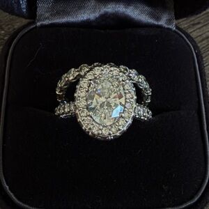 2ct Oval Diamond Set In Pavè halo platinum setting